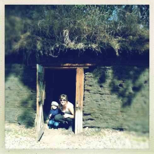 In the tiny dugout house